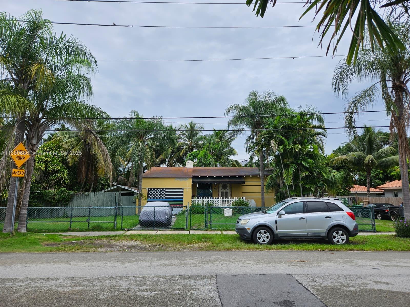 4021 Southwest 6th Street Miami, FL 33134 - Photo 6 of 14 a car parked in front of a house