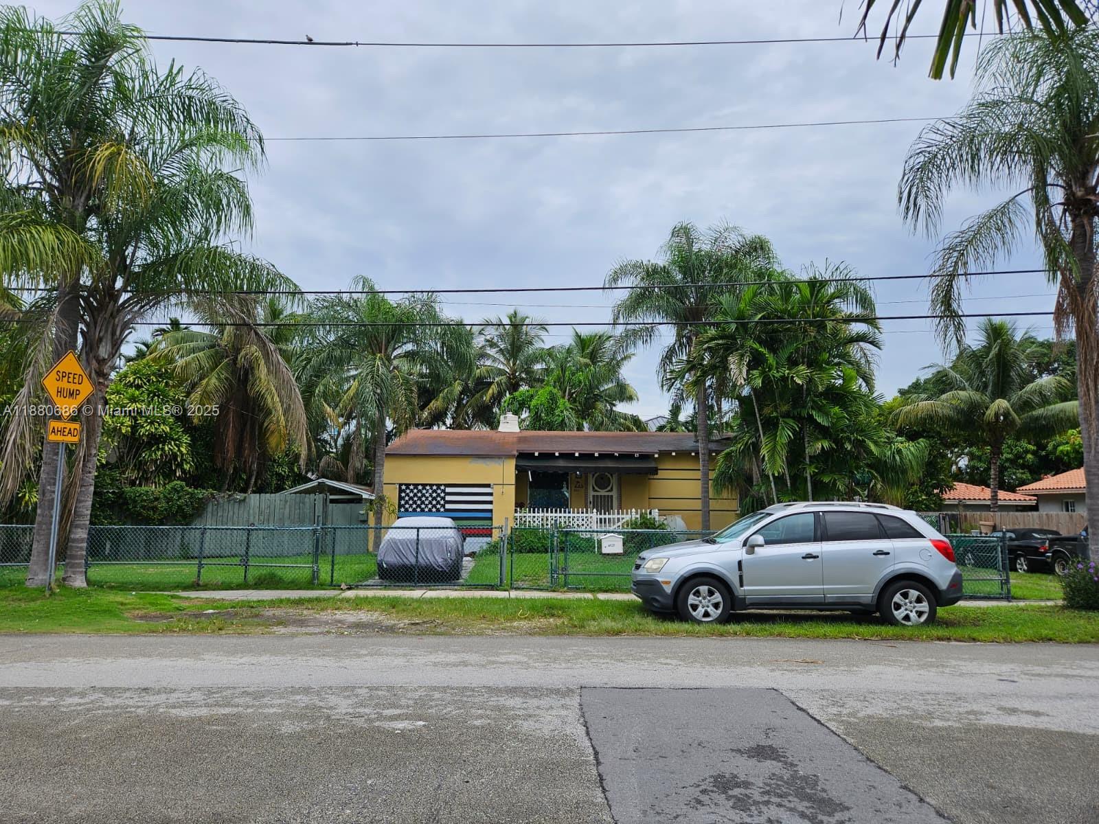4021 Southwest 6th Street Miami, FL 33134 - Photo 7 of 14 a view of a car parked in front of a building