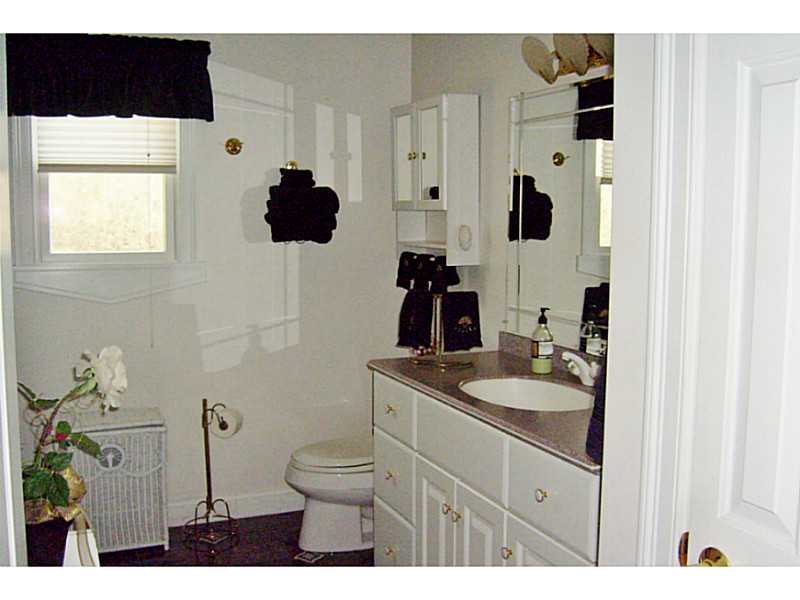 19 Spring House Lane Cumberland, RI 02864 - Photo 9 of 24 Bathroom. Guest bath with Tub/shower and Linen Closet.
