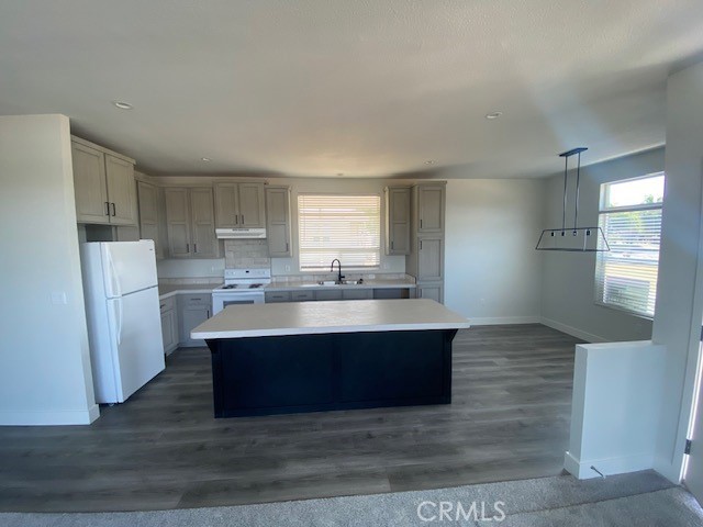 2920 Clark Road, Unit L6 Butte Valley, CA 95965 - Photo 3 of 26 a kitchen with stainless steel appliances granite countertop a sink and a refrigerator