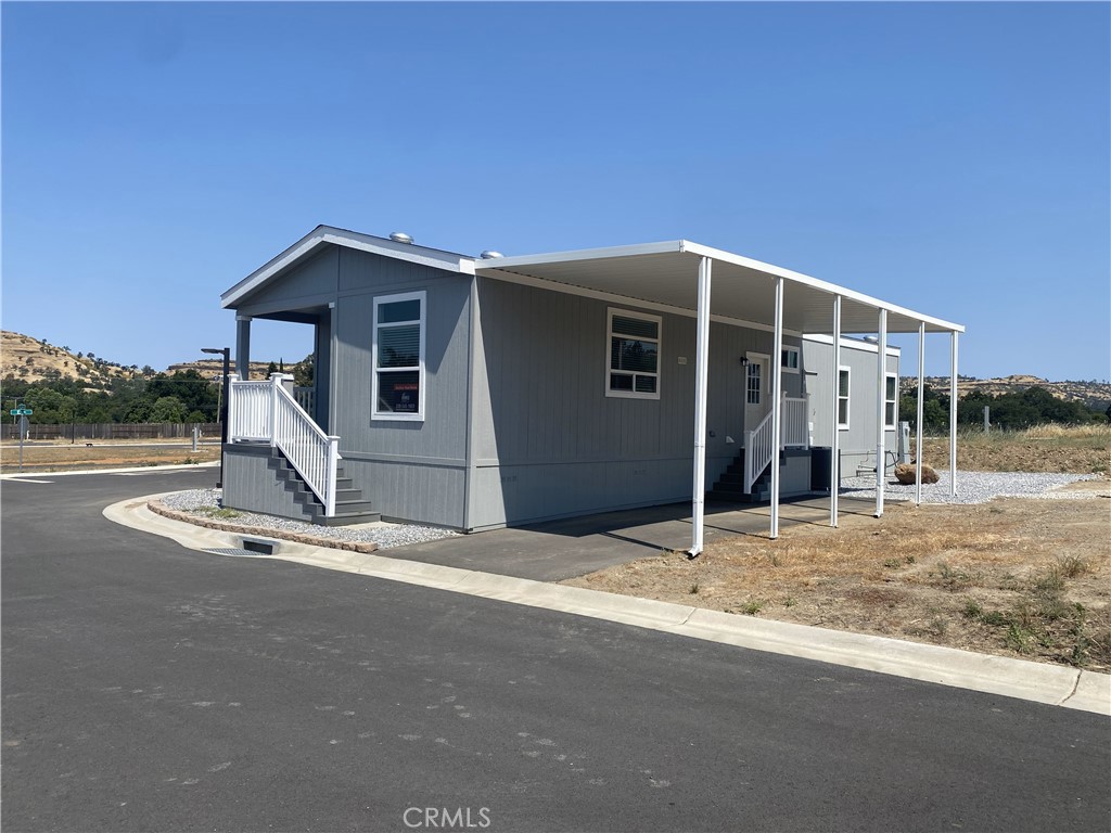 2920 Clark Road, Unit L6 Butte Valley, CA 95965 - Photo 10 of 26 a house with yard in front of it