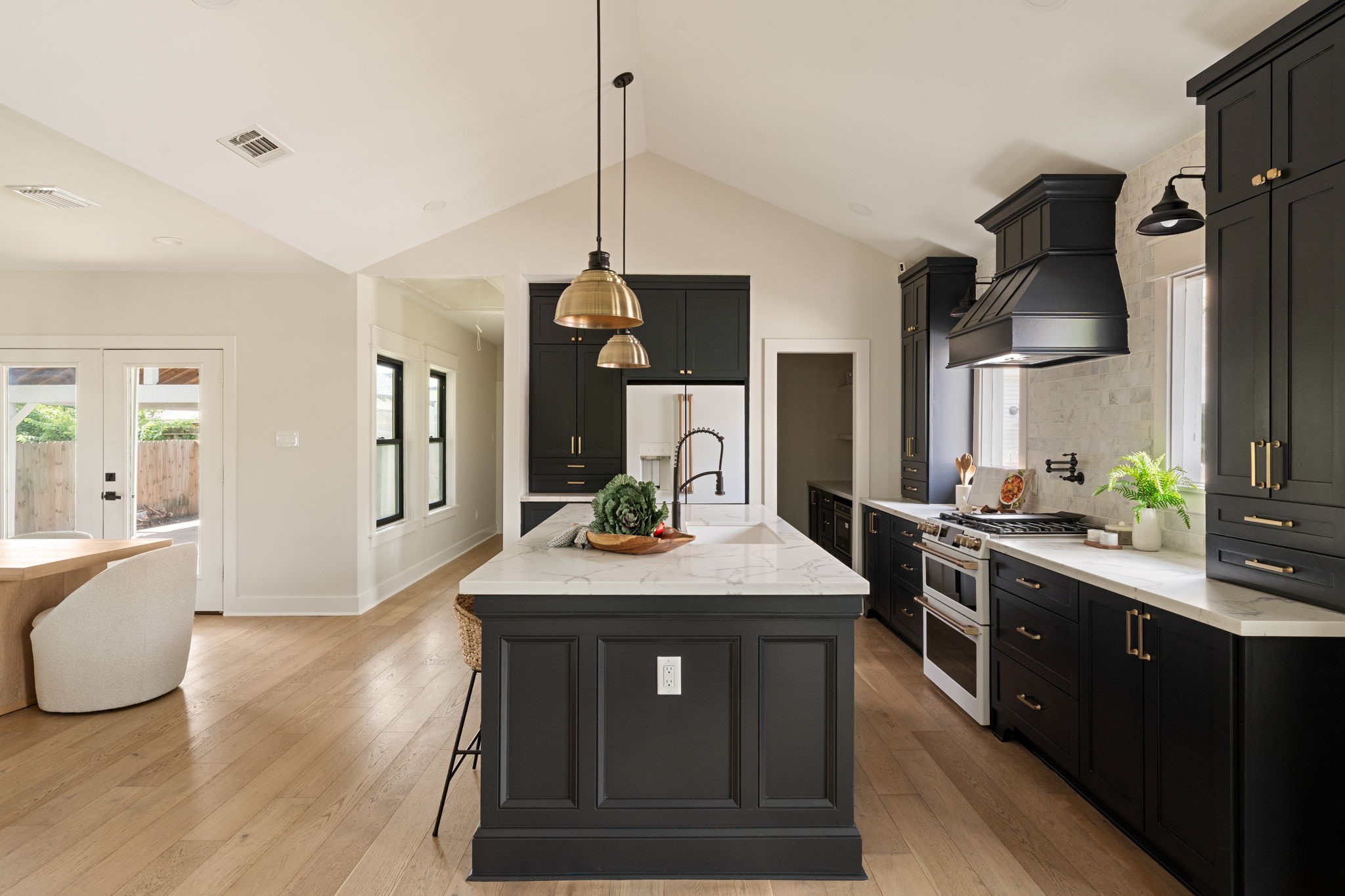 1022 Key Street Houston, TX 77009 - Photo 10 of 30 Your eyes are immediately drawn upward to the soaring vaulted ceilings.