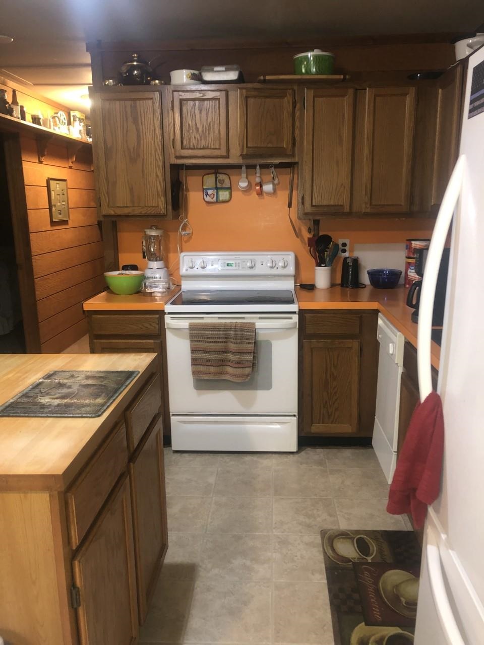 23359 German River Road Criders, VA 22820 - Photo 23 of 39 a kitchen with a stove and a refrigerator
