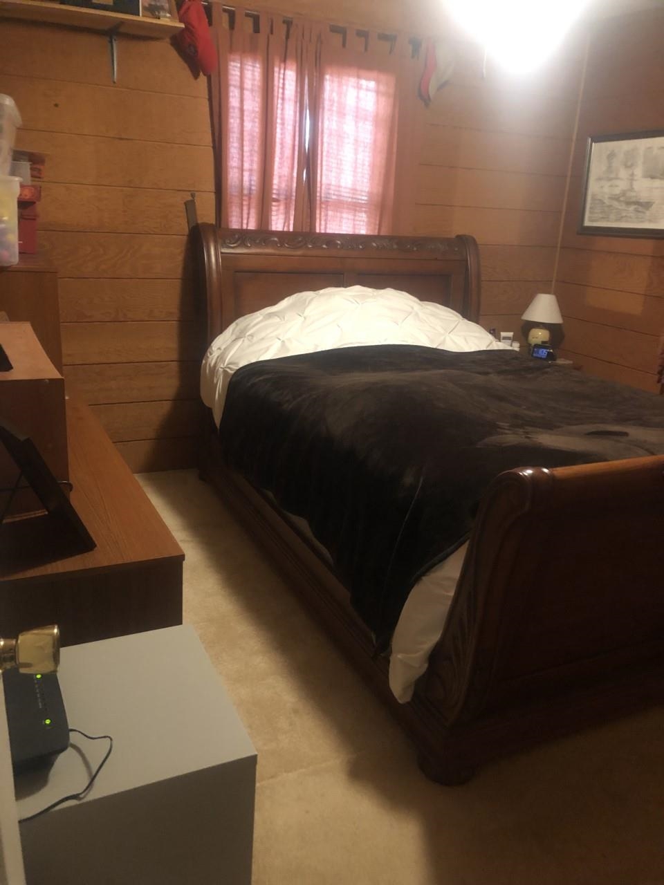 23359 German River Road Criders, VA 22820 - Photo 29 of 39 a bedroom with a bed and a window