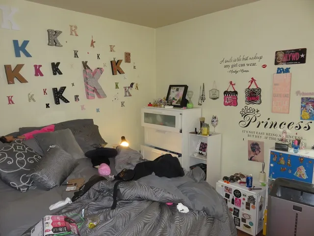 a kitchen with sink refrigerator and stove