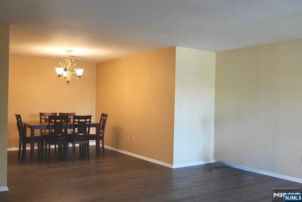 2009 Beatrice Court Mahwah, NJ 07430 - Photo 2 of 10 a view of a dining room with furniture and wooden floor