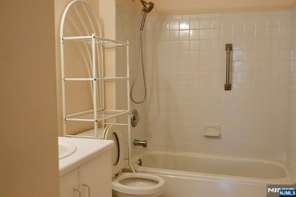 2009 Beatrice Court Mahwah, NJ 07430 - Photo 9 of 10 a bathroom with a sink a toilet and shower