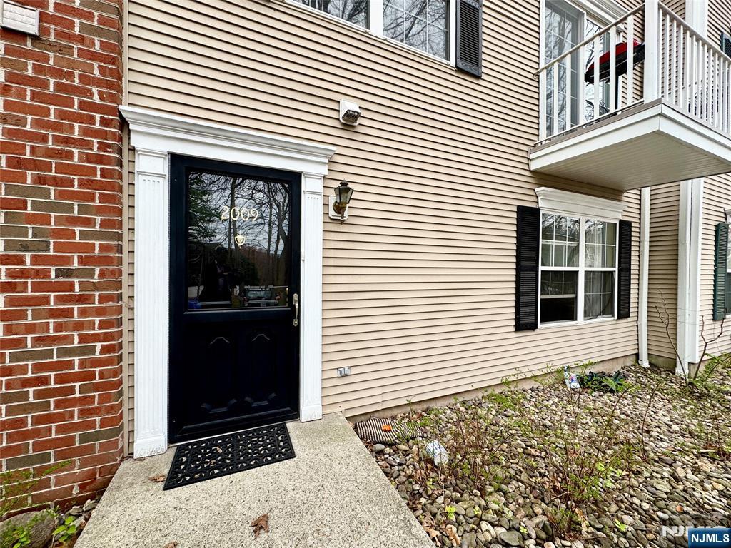 2009 Beatrice Court Mahwah, NJ 07430 - Photo 10 of 10 a view of a house with a door and a window