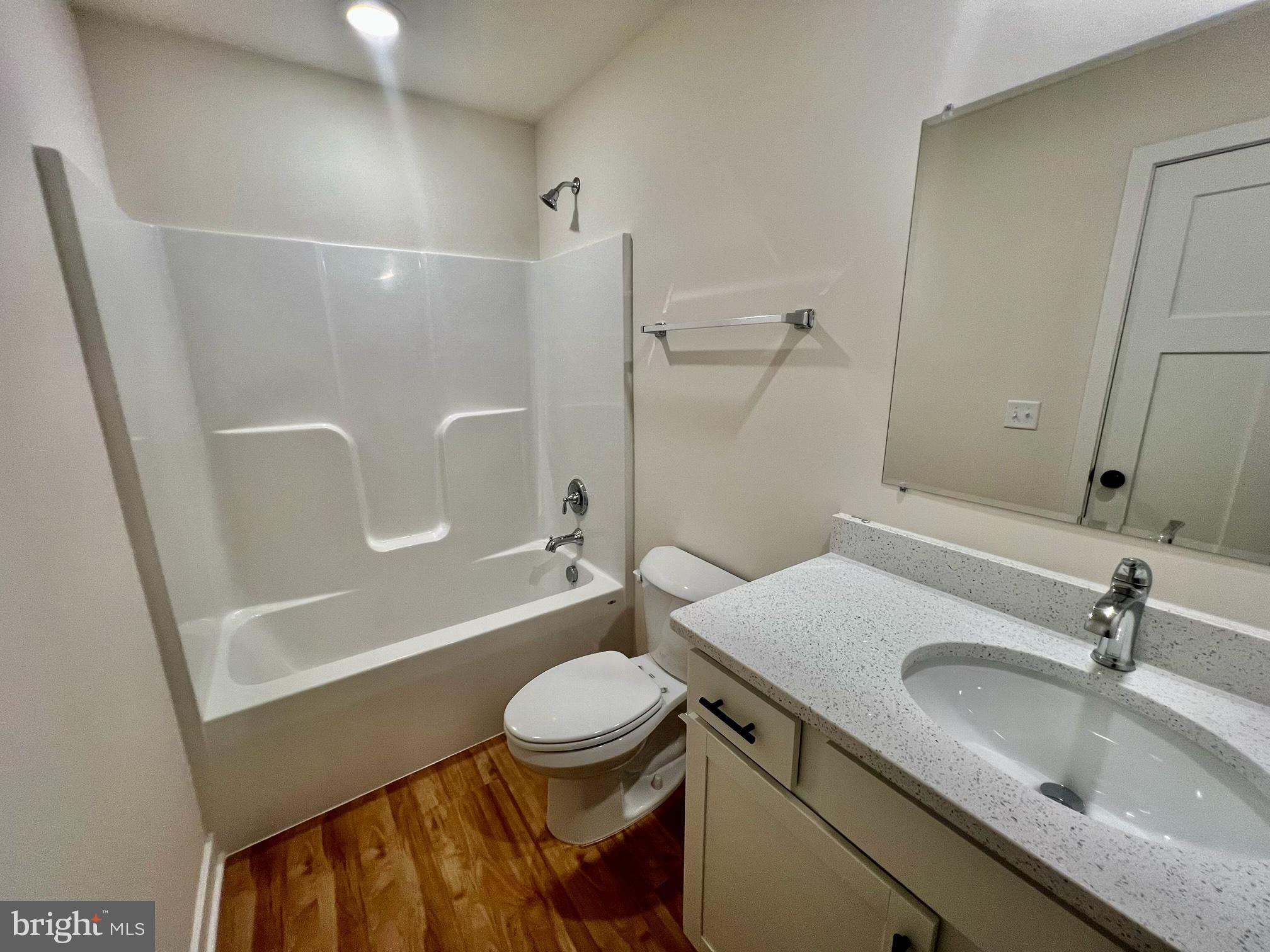 102 Azalea Way Colonial Beach, VA 22443 - Photo 9 of 10 a bathroom with a sink a toilet and shower