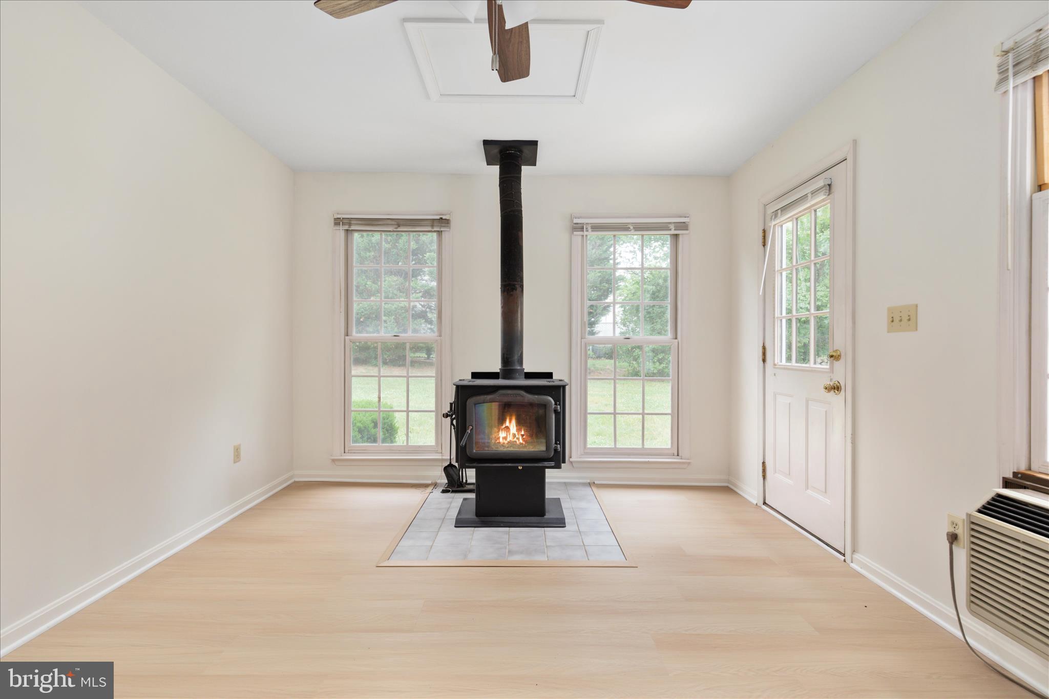 109 Artillery Road Winchester, VA 22602 - Photo 19 of 72 Sunroom w/woodstove