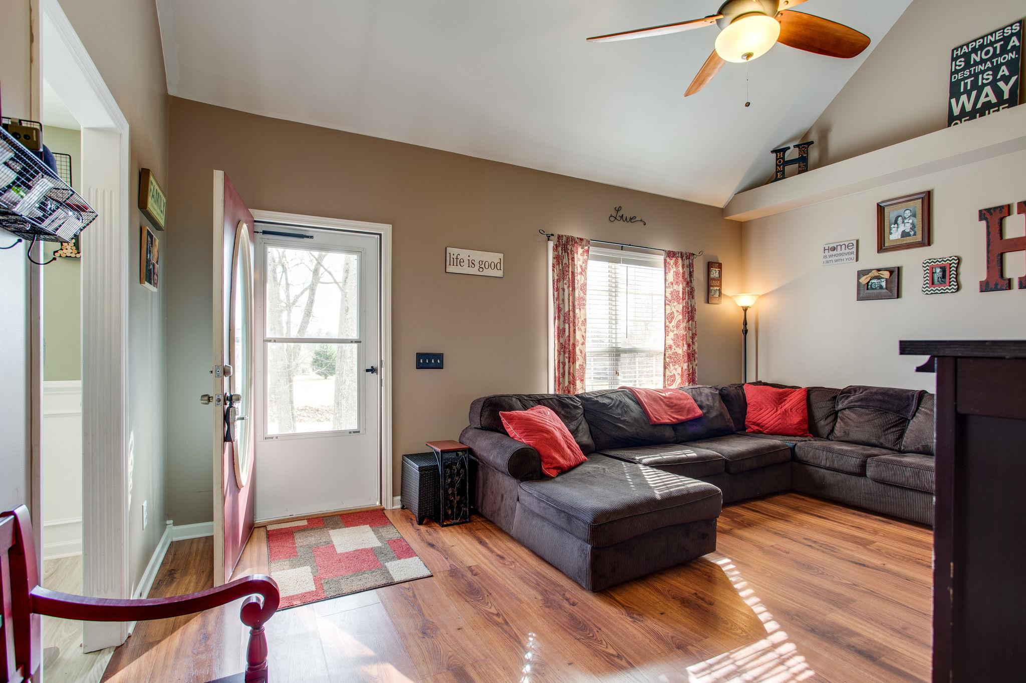 1967 Lasea Road Spring Hill, TN 37174 - Photo 3 of 30 a living room with furniture and a window