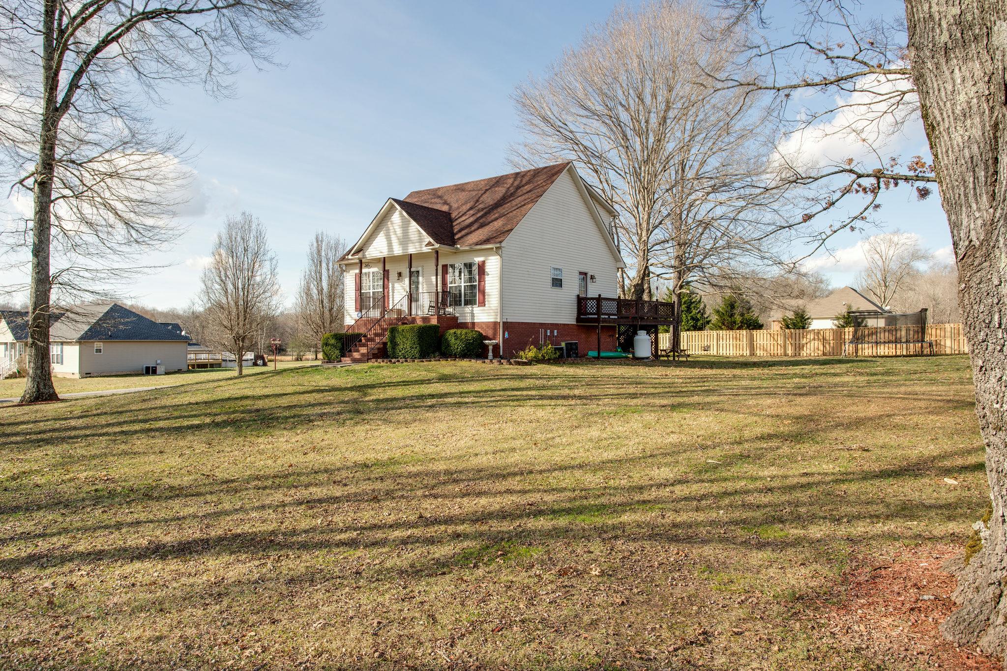 1967 Lasea Road Spring Hill, TN 37174 - Photo 22 of 30 a view of a house with a yard
