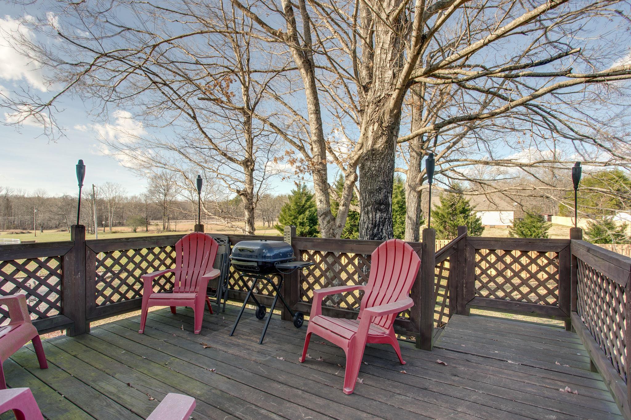 1967 Lasea Road Spring Hill, TN 37174 - Photo 28 of 30 a view of a chairs setting on the deck