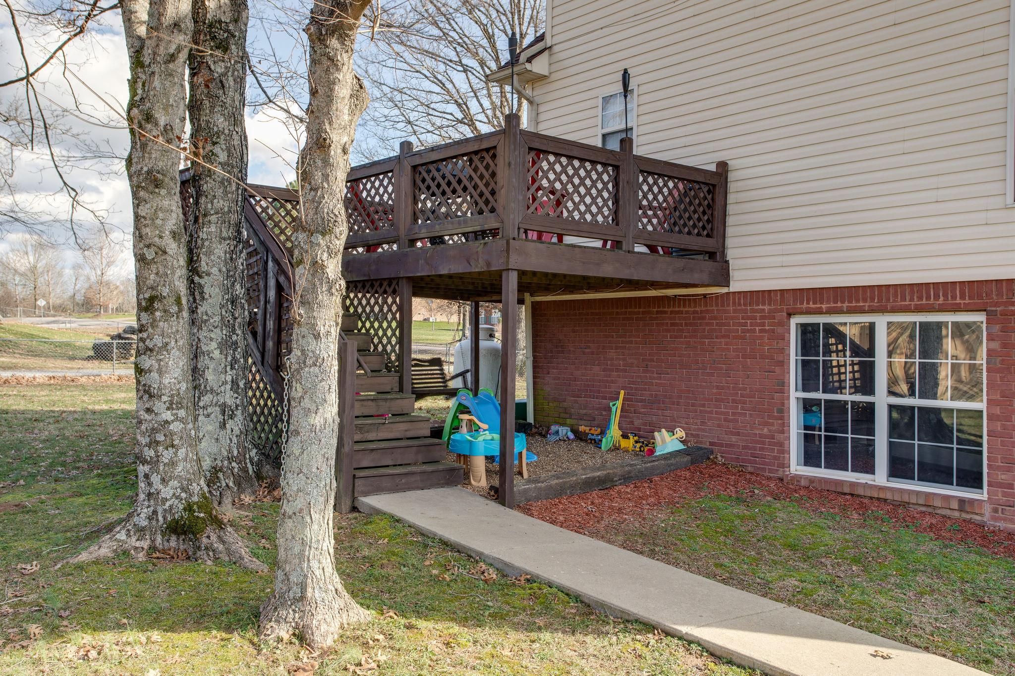 1967 Lasea Road Spring Hill, TN 37174 - Photo 29 of 30 a view of a house with brick walls
