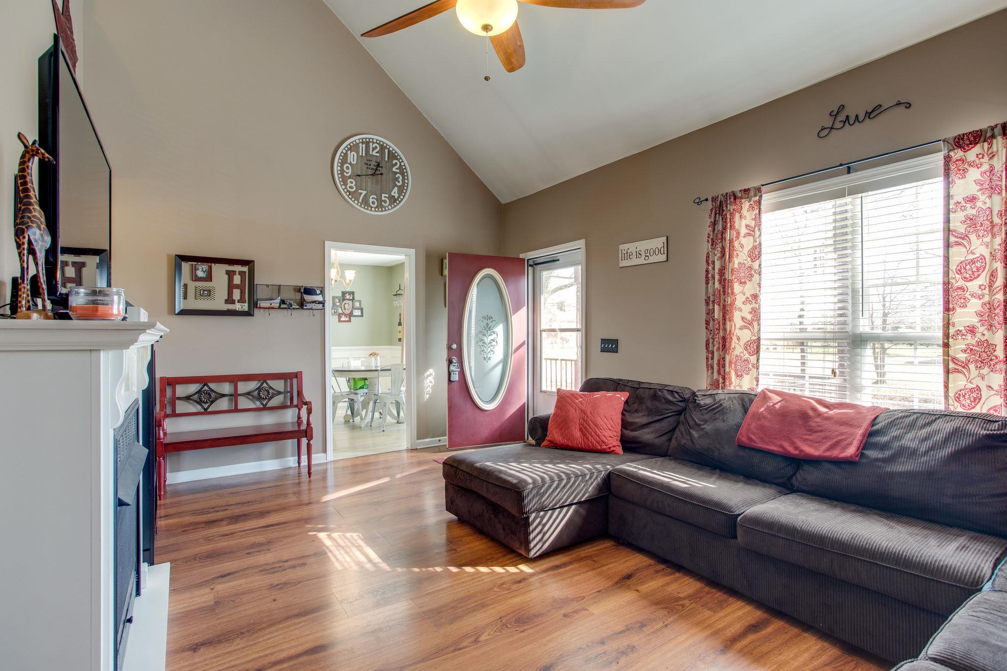 1967 Lasea Road Spring Hill, TN 37174 - Photo 6 of 30 a living room with furniture and a window
