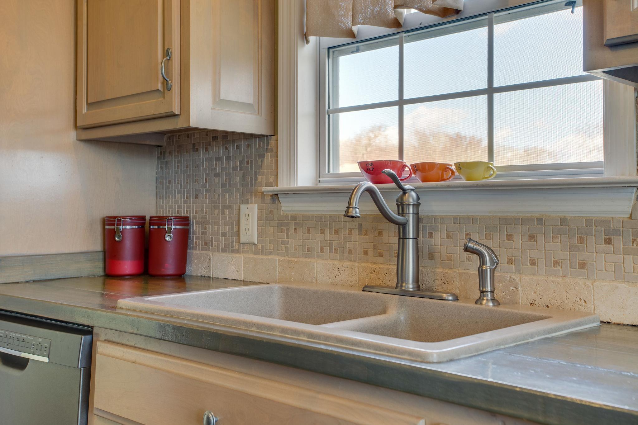1967 Lasea Road Spring Hill, TN 37174 - Photo 10 of 30 a kitchen with a sink and a window