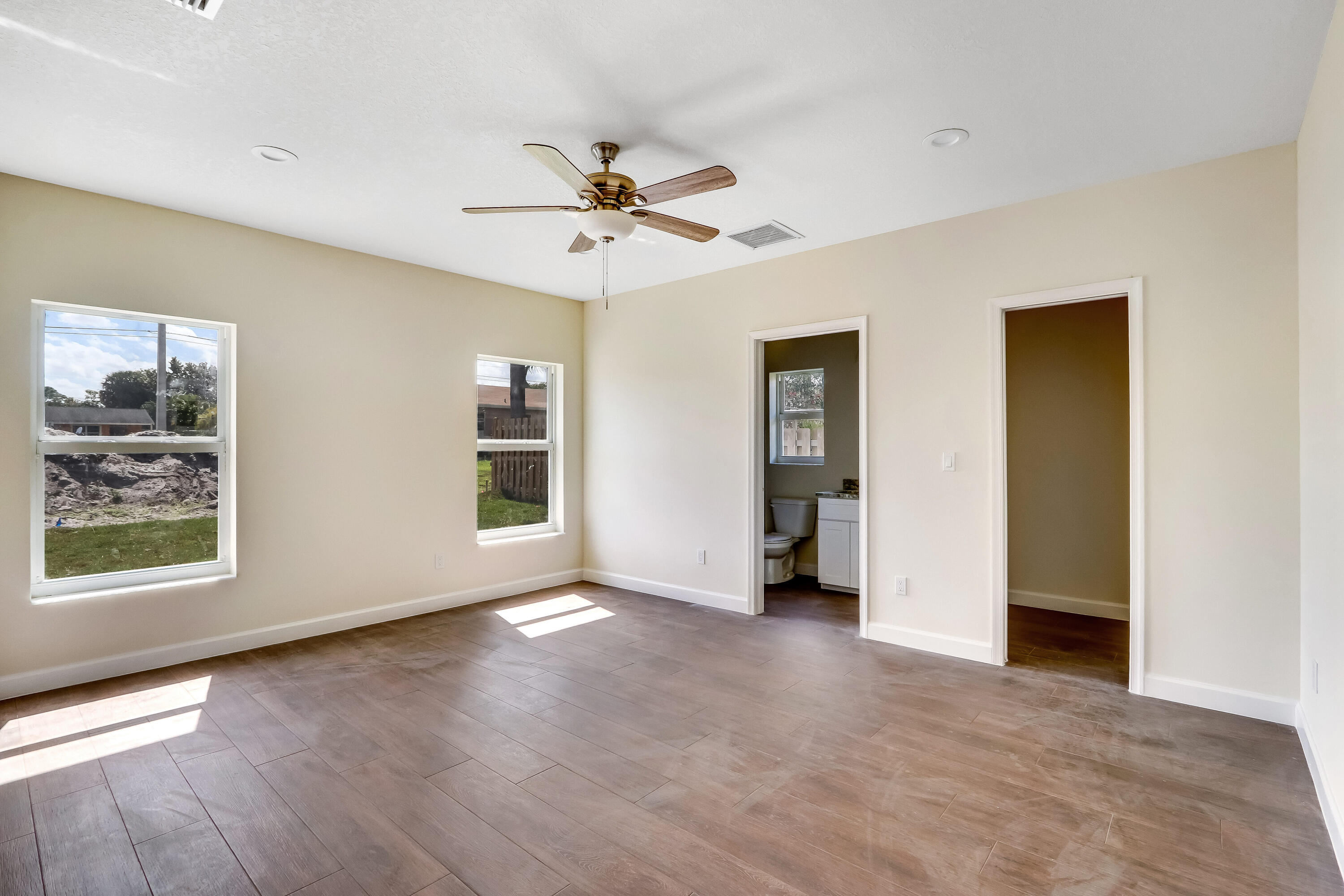 936 Southeast 6th Street Stuart, FL 34994 - Photo 19 of 25 a view of an empty room with a window