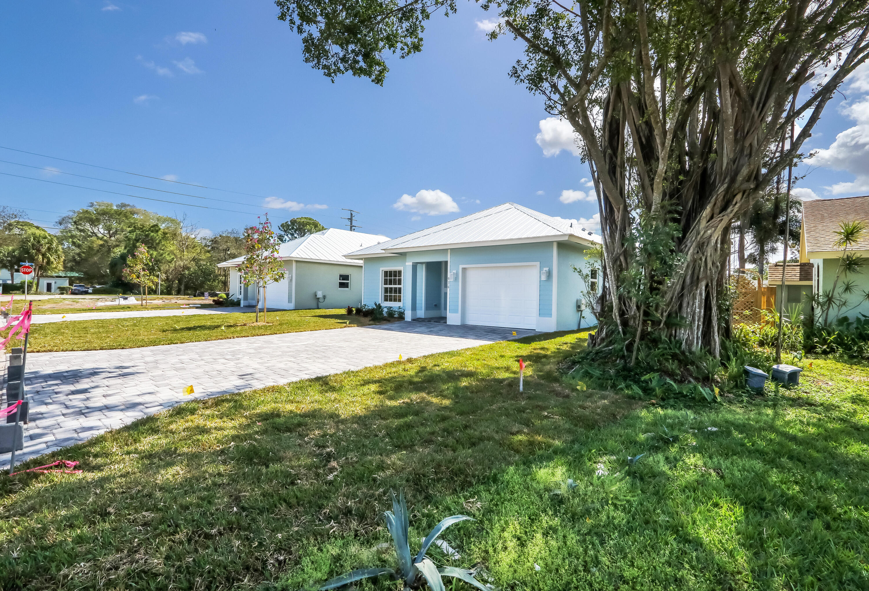 936 Southeast 6th Street Stuart, FL 34994 - Photo 3 of 25 a view of a house with a yard