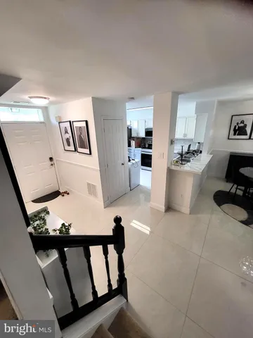 a view of a living room and furniture