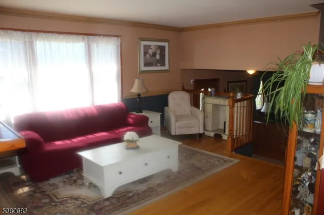 a kitchen with granite countertop a sink and cabinets