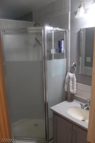 a bathroom with a bathtub and a toilet