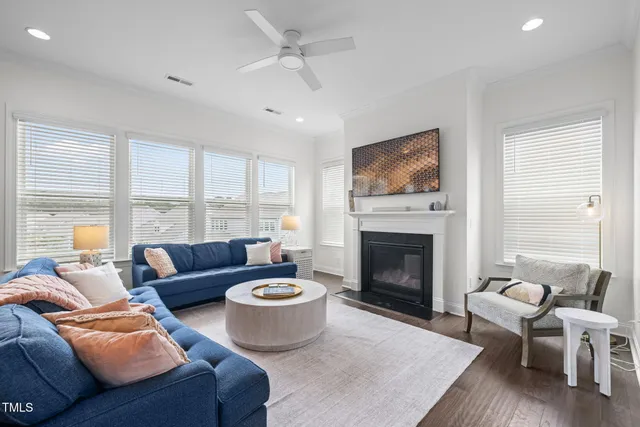 a large kitchen with a table and chairs