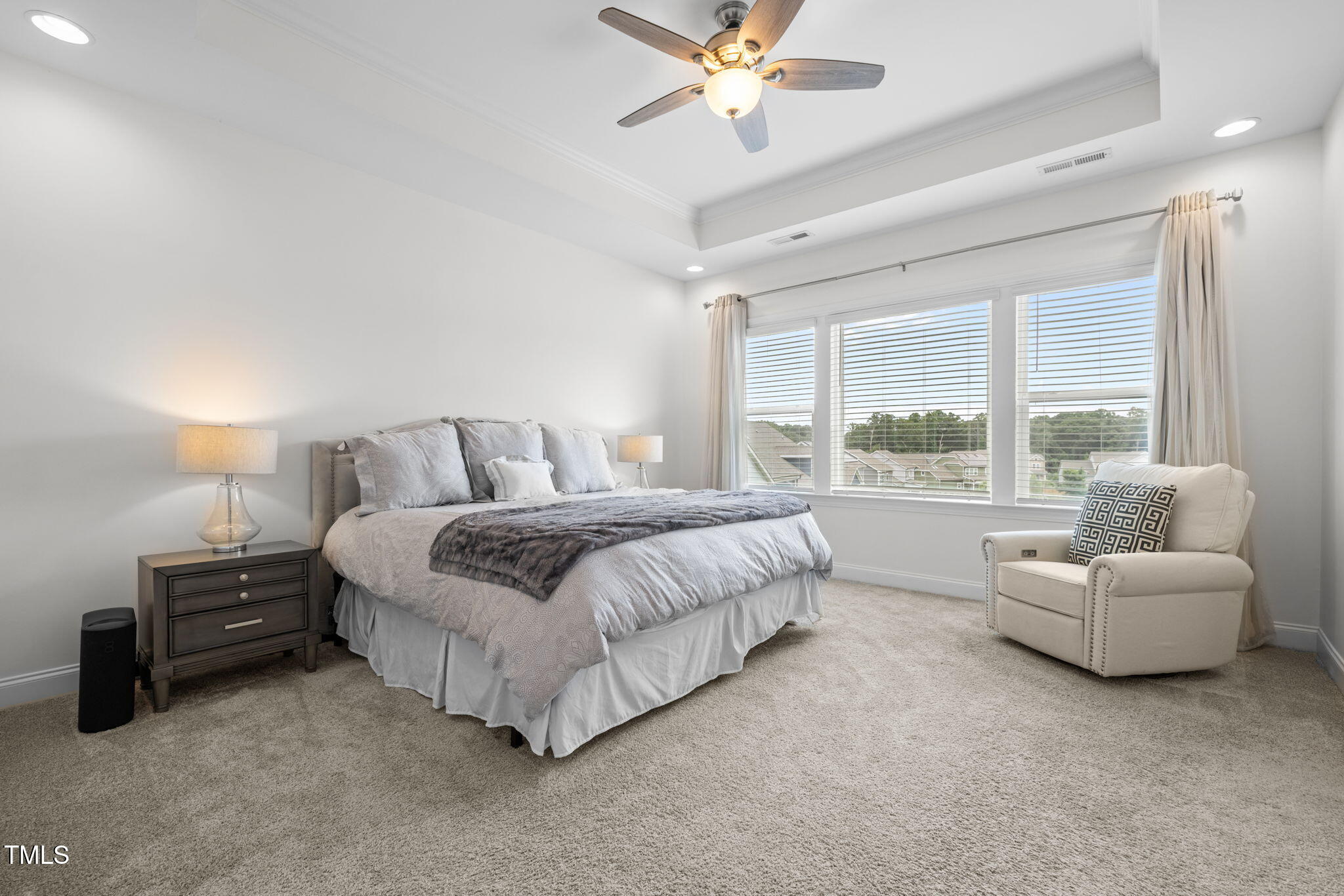 1606 Spring Overlook Lane Hillsborough, NC 27278 - Photo 28 of 56 a bedroom with a bed and a large window