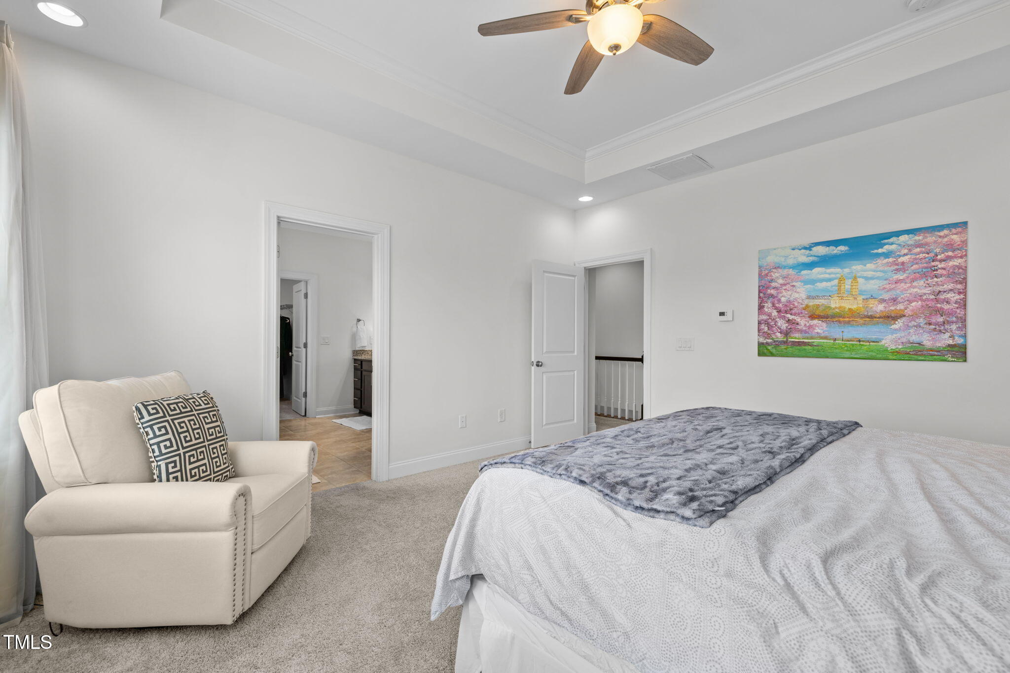 1606 Spring Overlook Lane Hillsborough, NC 27278 - Photo 29 of 56 a spacious bedroom with a bed and furniture