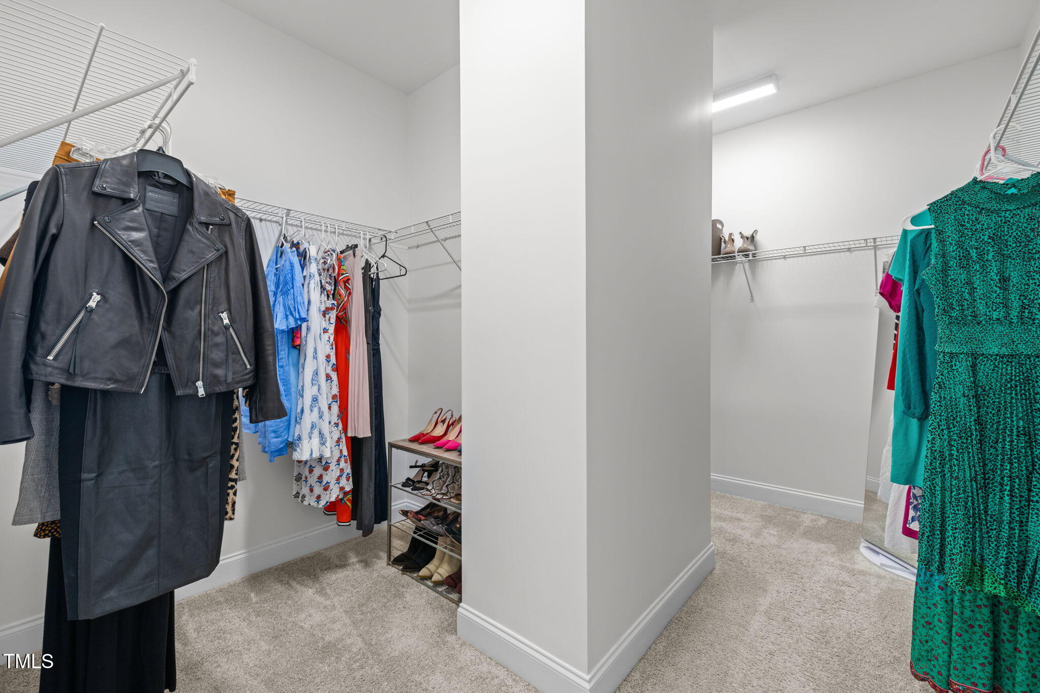 1606 Spring Overlook Lane Hillsborough, NC 27278 - Photo 33 of 56 a view of walk in closet with clothes