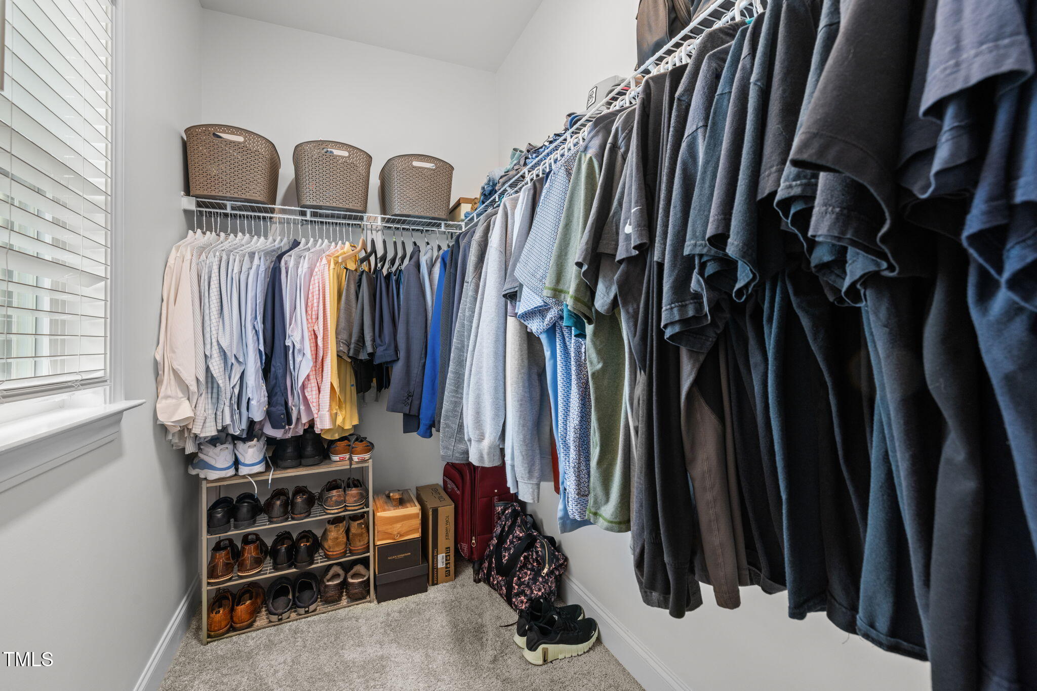 1606 Spring Overlook Lane Hillsborough, NC 27278 - Photo 34 of 56 a view of walk in closet with clothes and shoes