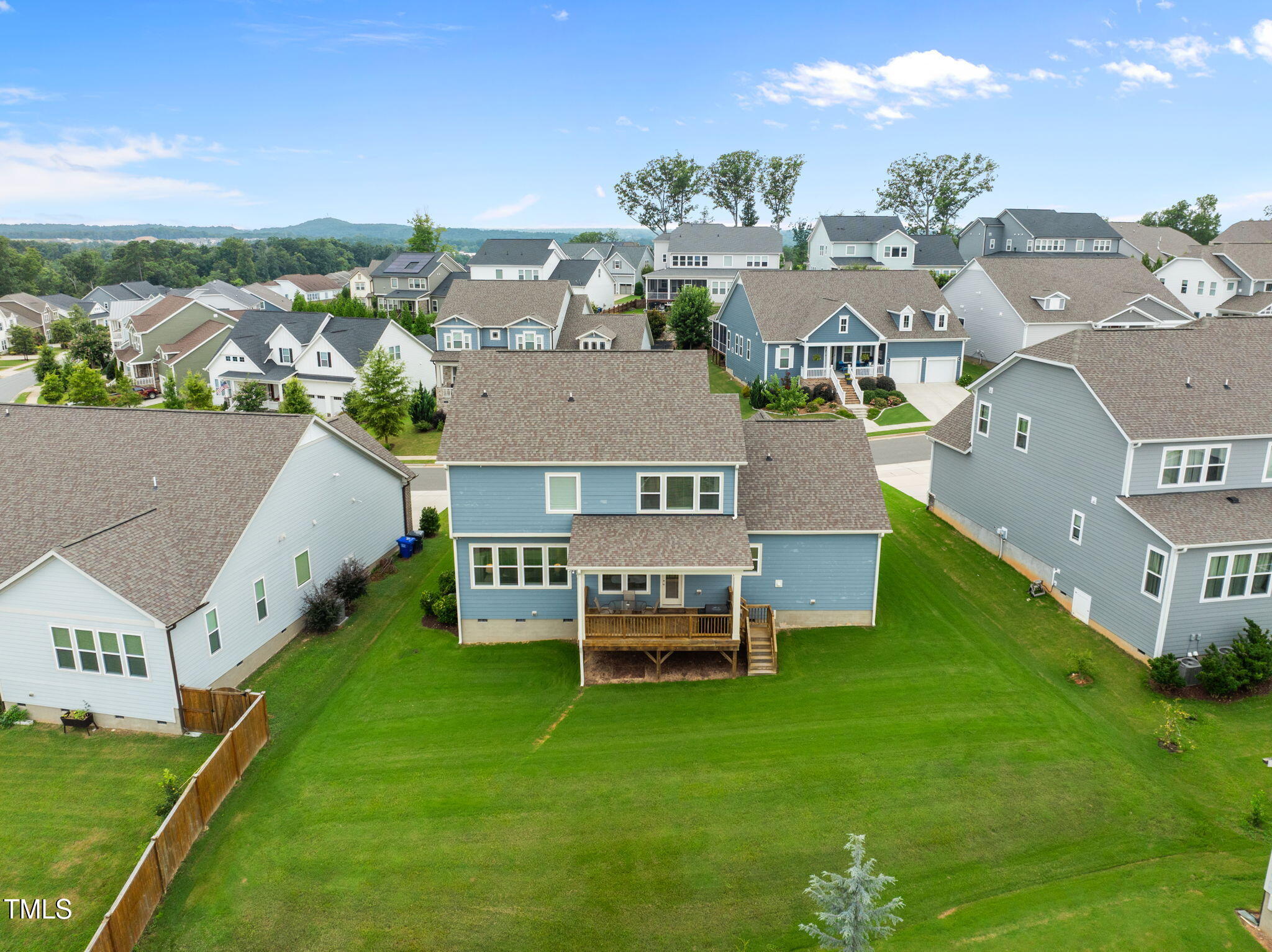 1606 Spring Overlook Lane Hillsborough, NC 27278 - Photo 49 of 56 an aerial view of a house with a garden and houses