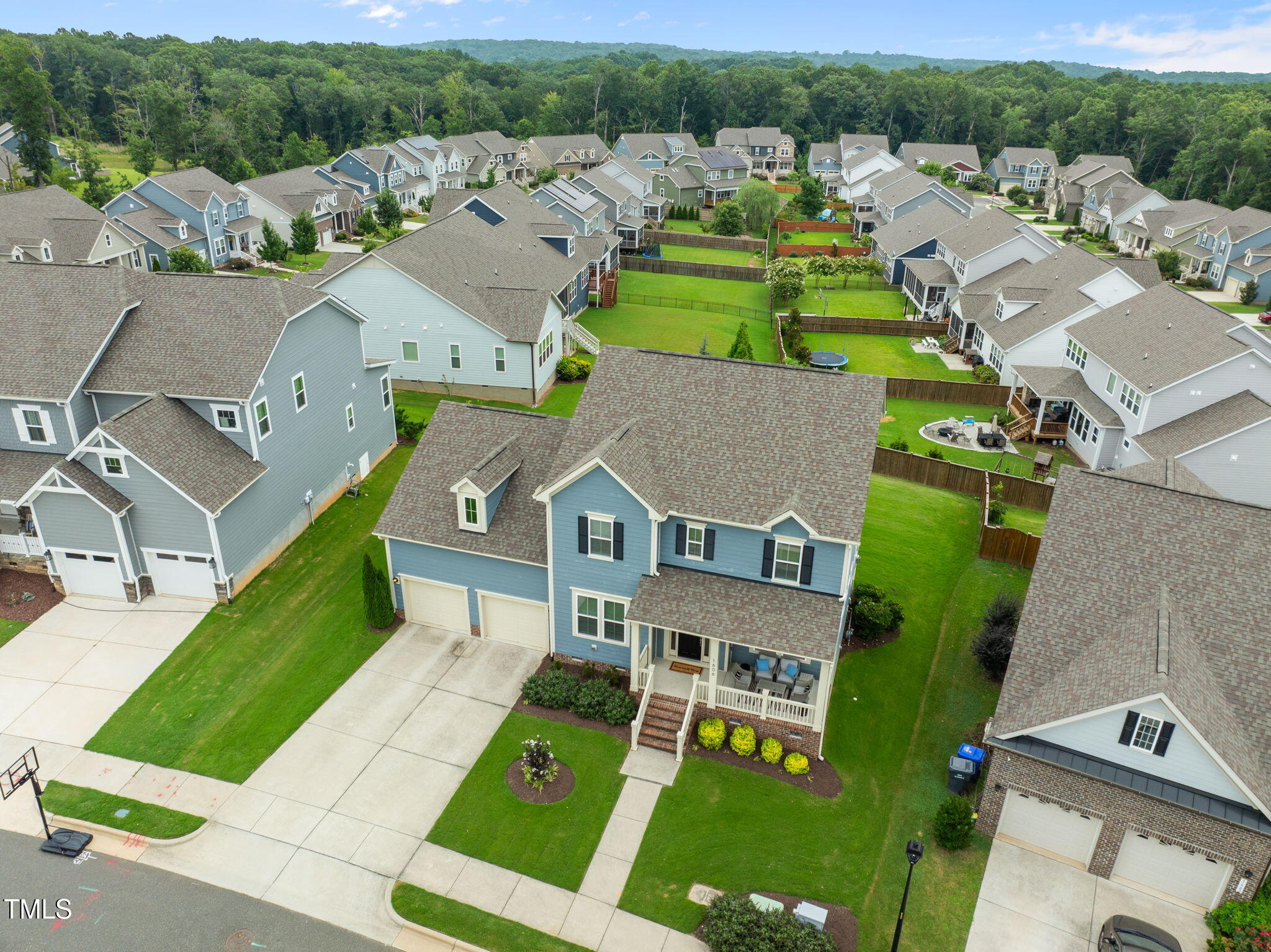 1606 Spring Overlook Lane Hillsborough, NC 27278 - Photo 52 of 56 an aerial view of a house with a garden