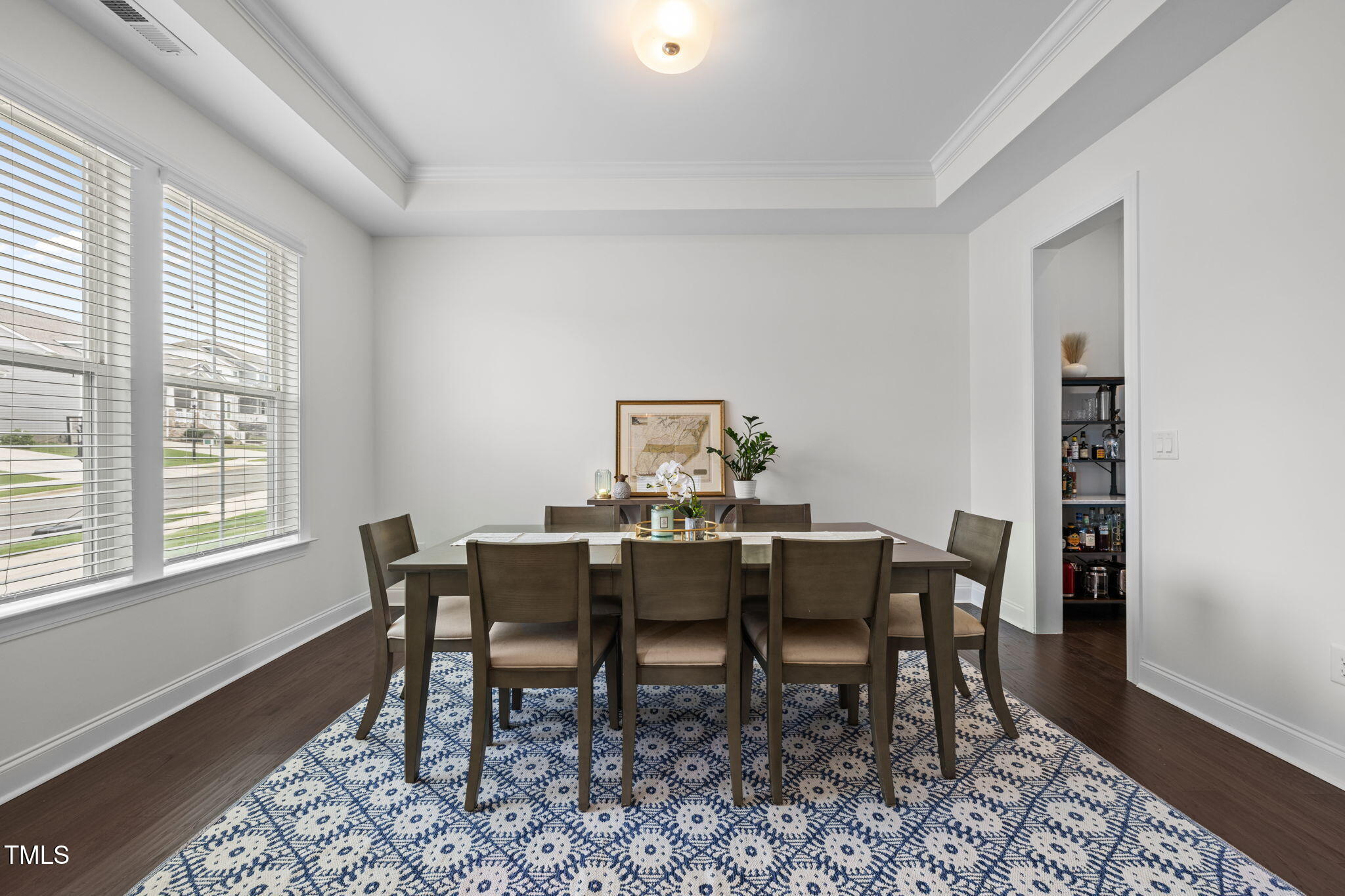 1606 Spring Overlook Lane Hillsborough, NC 27278 - Photo 6 of 56 a view of a dining room with furniture window and wooden floor