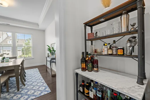 a kitchen with stainless steel appliances granite countertop a sink a stove and a cabinets
