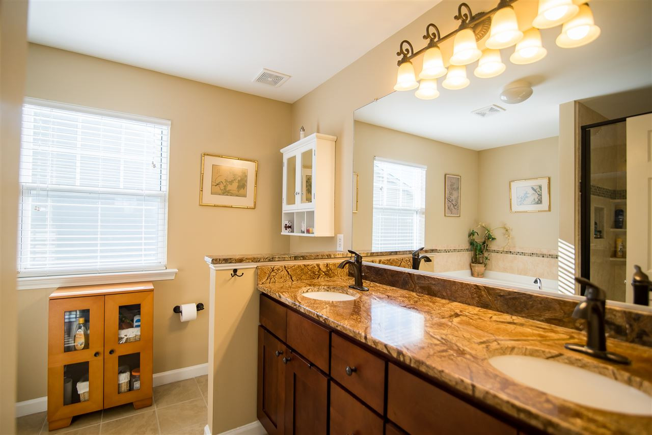 2307 Bright Future Way Raleigh, NC 27614 - Photo 15 of 23 This completely renovated master bathroom has it all! Extra large walk-in shower, soaking tub and his & hers sinks. Master Bathroom