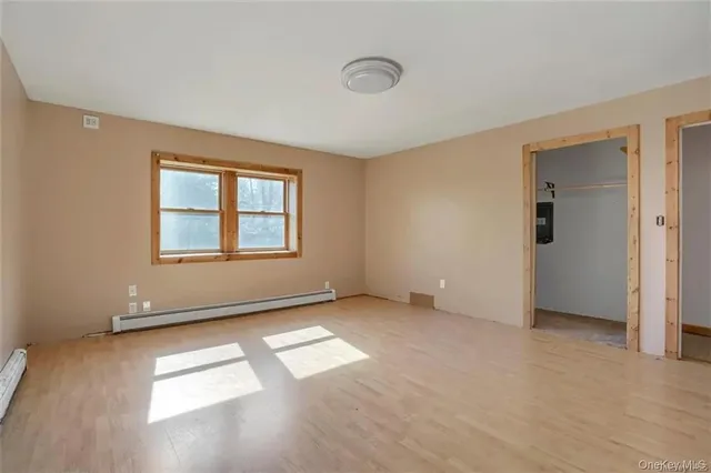 an empty room with windows