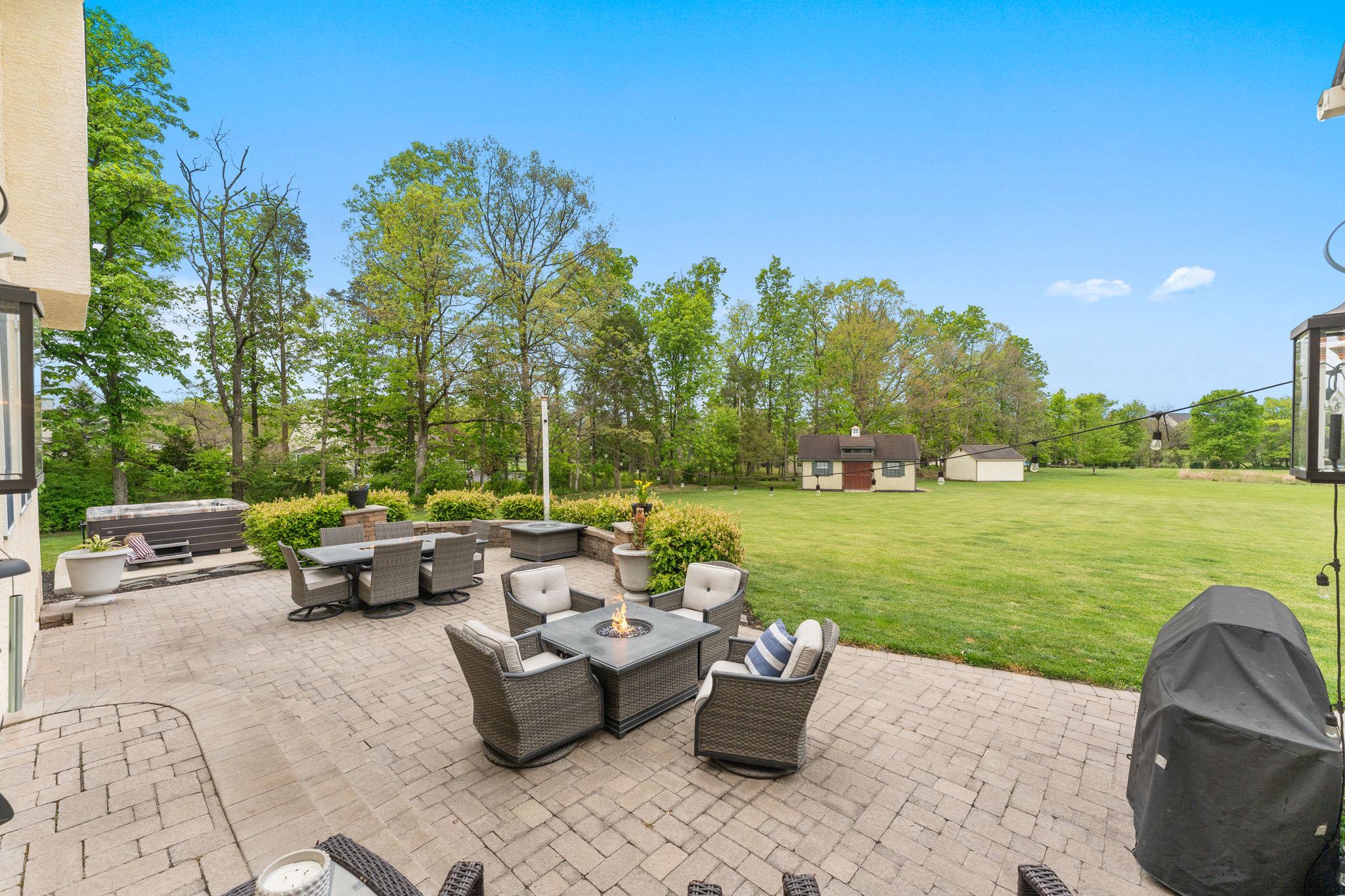 912 Ashbourne Way Schwenksville, PA 19473 - Photo 5 of 45 Gorgeous oversized Paver Patio, Look at that view!