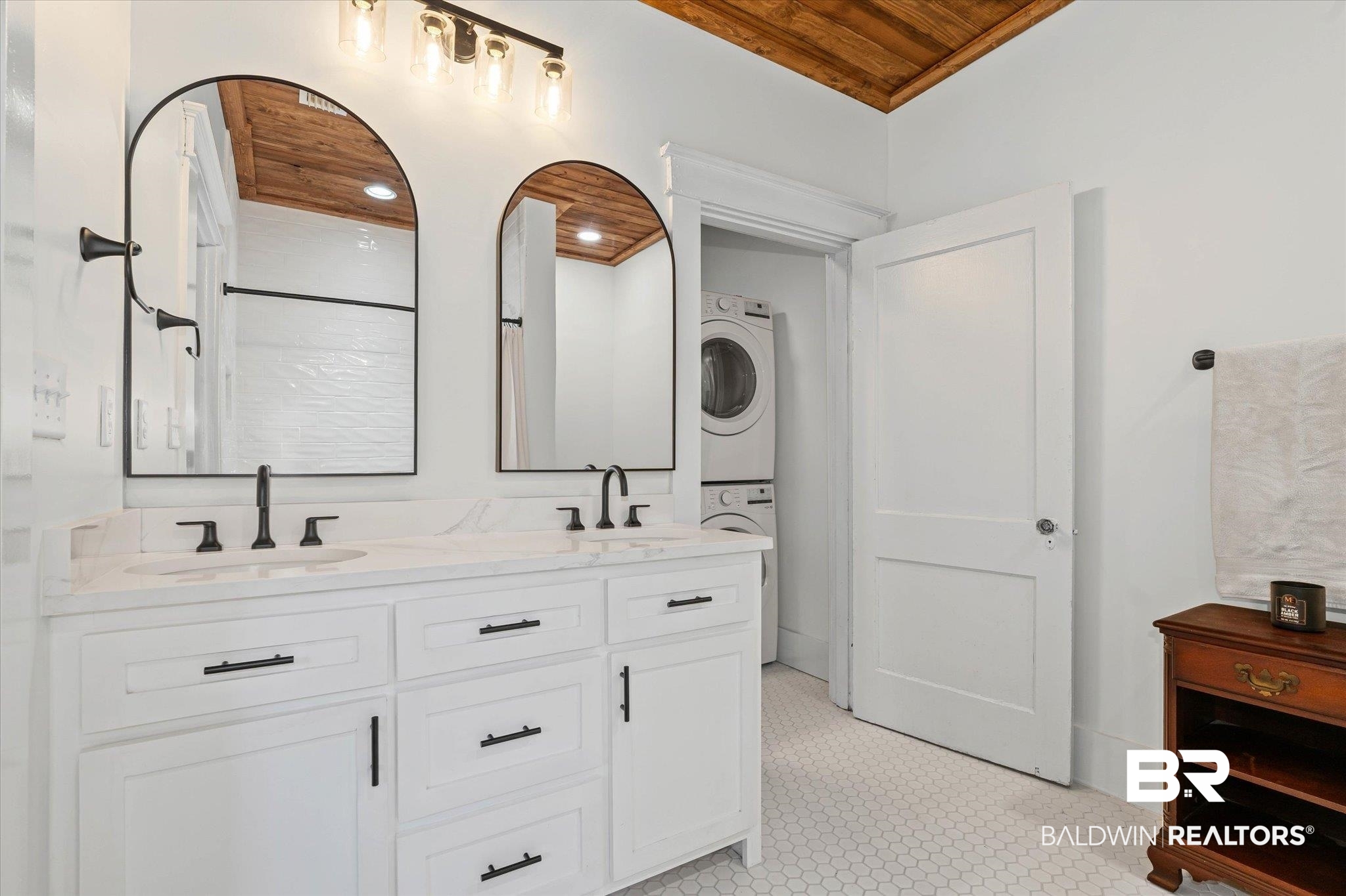 11 South Lafayette Street Mobile, AL 36604 - Photo 4 of 20 Full bathroom featuring double vanity and stacked washer and clothes dryer