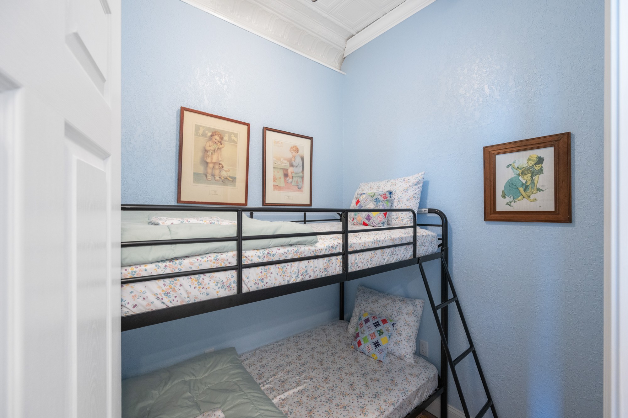 8 East Main Street Decaturville, TN 38329 - Photo 10 of 27 a view of a hallway with paintings on the wall