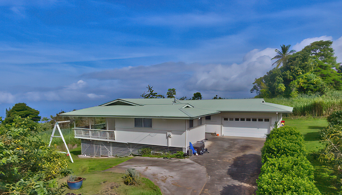82-1019 KOA Road Captain Cook, HI 96704 - Photo 15 of 19 an aerial view of a house with a yard