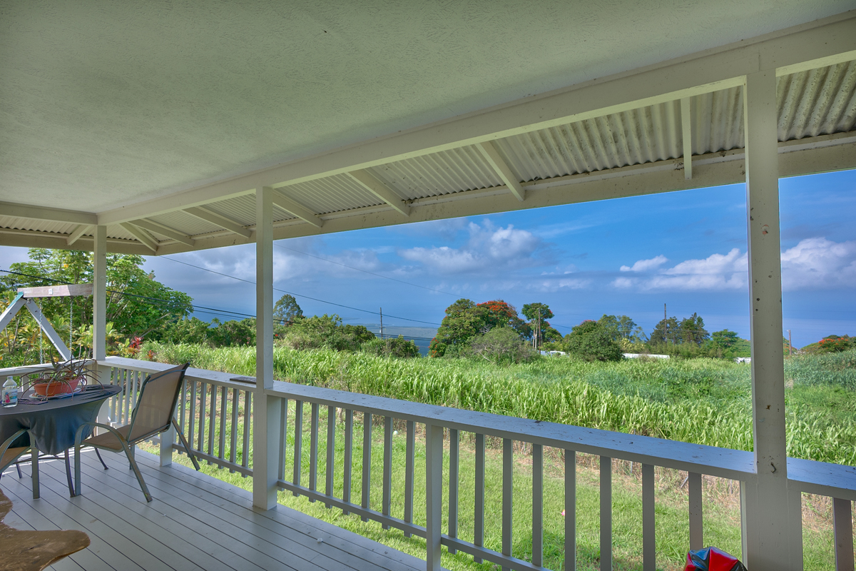 82-1019 KOA Road Captain Cook, HI 96704 - Photo 2 of 17 a view of a two chairs with wooden floor