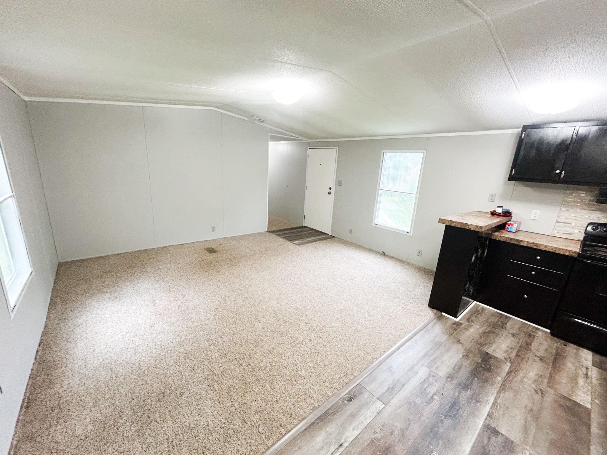 398 2nd Street Big Sandy, TN 38221 - Photo 13 of 26 an empty room with a bed and a window