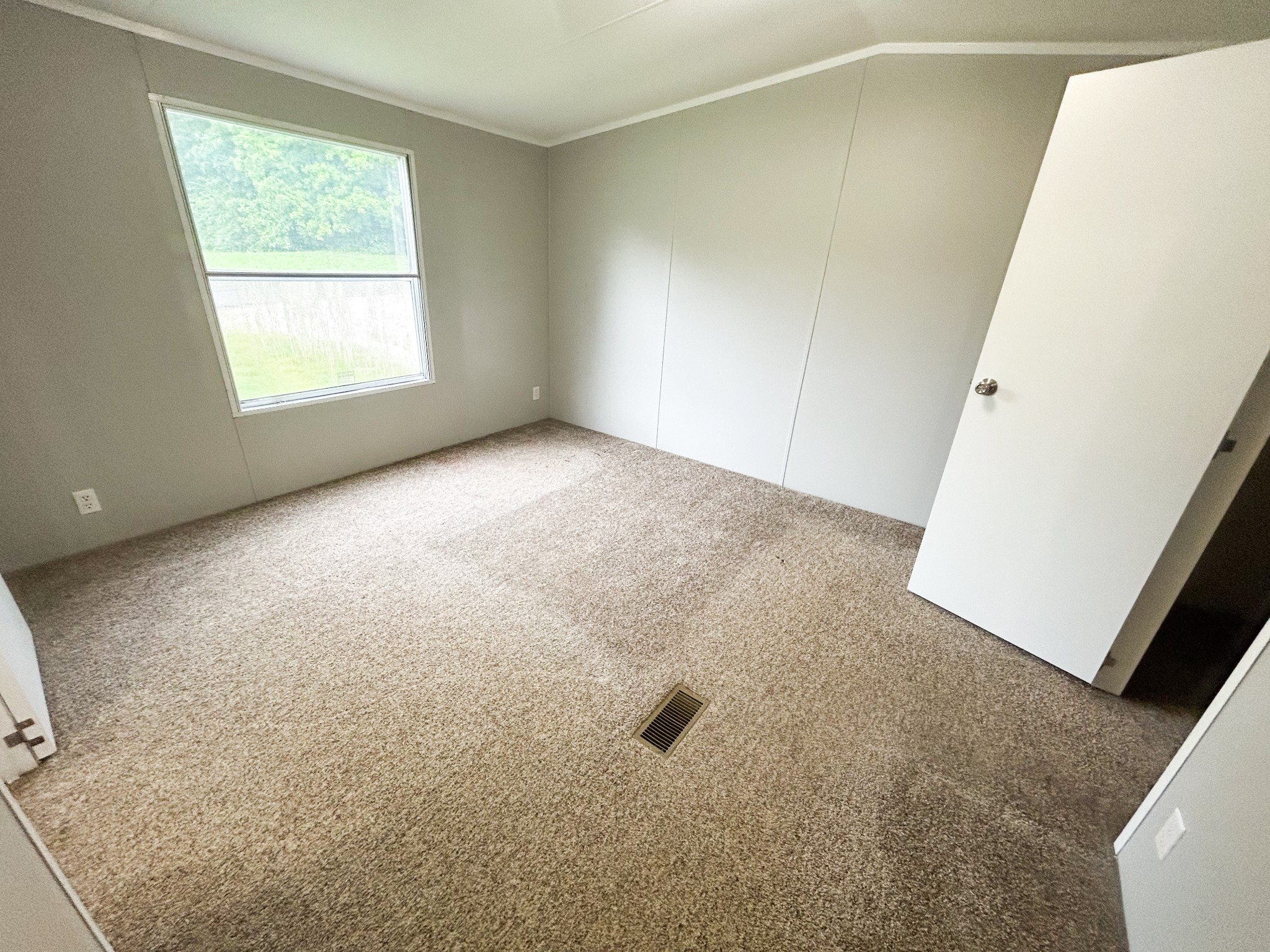 398 2nd Street Big Sandy, TN 38221 - Photo 24 of 26 a view of an empty room and a window