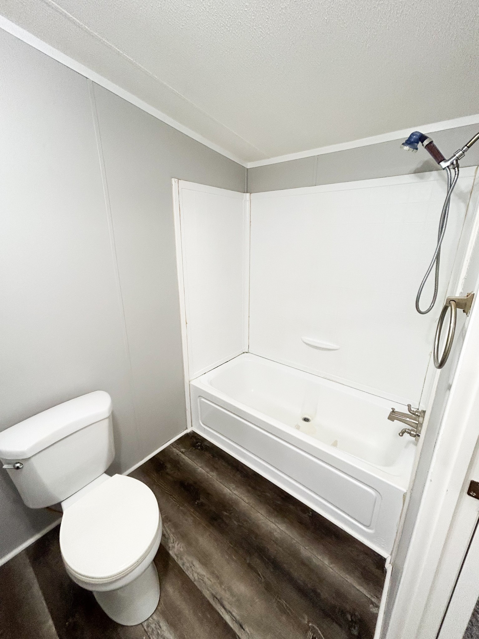 398 2nd Street Big Sandy, TN 38221 - Photo 26 of 26 a bathroom with a toilet and a shower