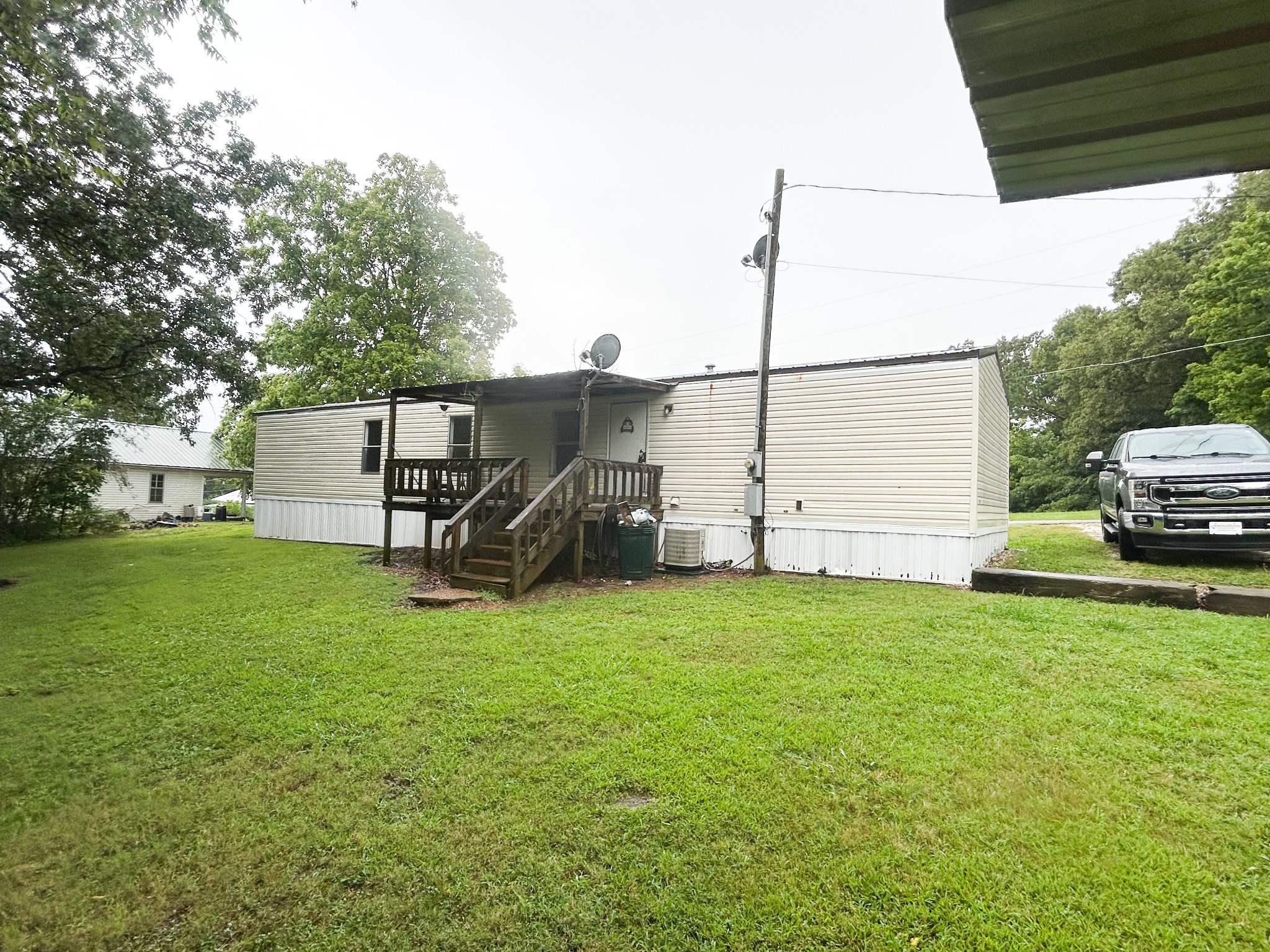 398 2nd Street Big Sandy, TN 38221 - Photo 8 of 26 a view of a house with backyard