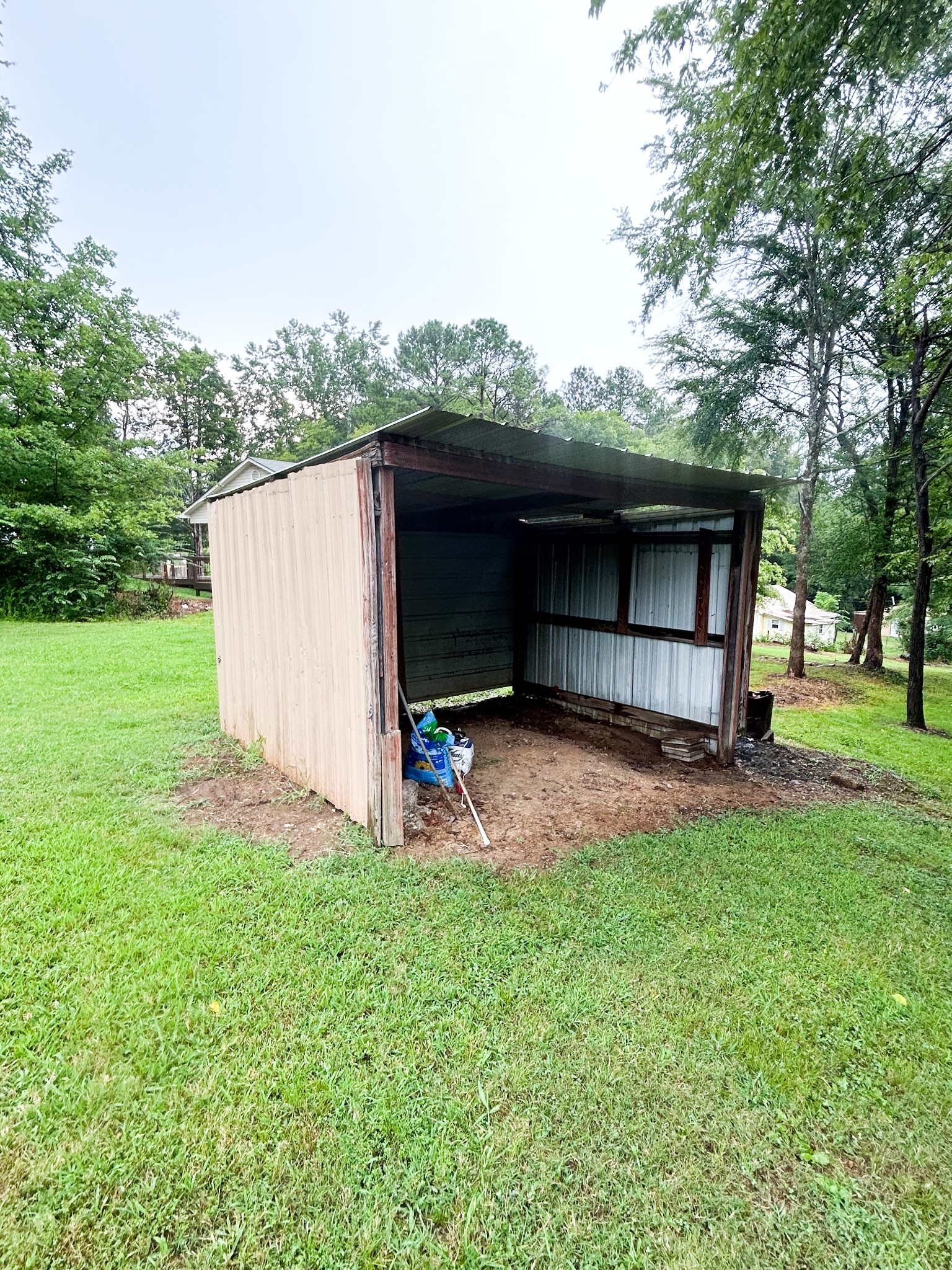 398 2nd Street Big Sandy, TN 38221 - Photo 9 of 26 a house view with a garden space