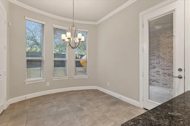 a view of empty room with windows and outdoor view