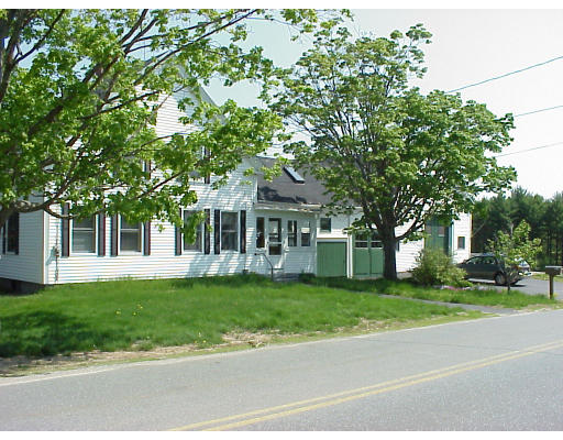 90 North End Road Townsend, MA 01469 - Photo 2 of 2 a front view of a house with a garden