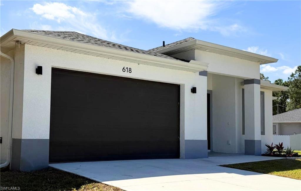 618 Sheldon Avenue Lehigh Acres, FL 33936 - Photo 2 of 35