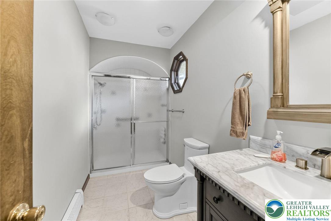 394 Flagstaff Road Lehighton, PA 18235 - Photo 23 of 75 a bathroom with a granite countertop sink toilet and shower